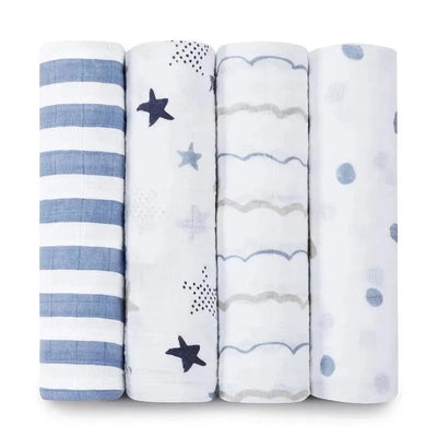 Classic swaddle set featuring four soft, breathable muslin blankets in various patterns including stripes and stars.