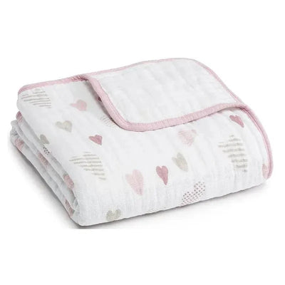 Aden + Anais Dream Blanket in Heart Breaker design, featuring soft white fabric with colorful heart patterns and a pink border.