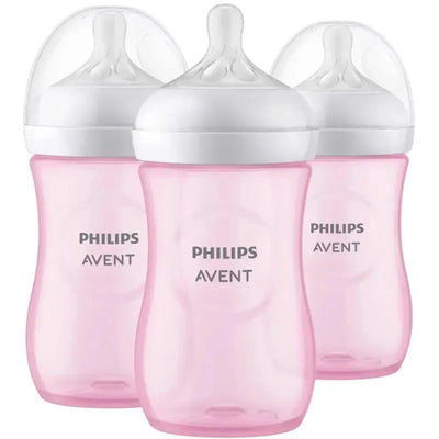 Three pink Philips Avent 9oz baby bottles with natural response nipples, designed for comfortable feeding.
