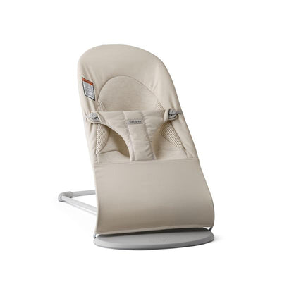 Adjustable BabyBjörn Bouncer Balance Soft in light beige, featuring harness and breathable fabric seat.