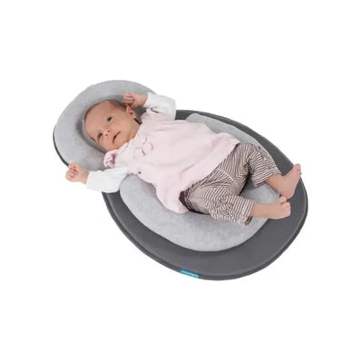 Babymoov Socosy Premium Baby Lounger features a comfortably nestled baby in a soft, grey fabric recliner.