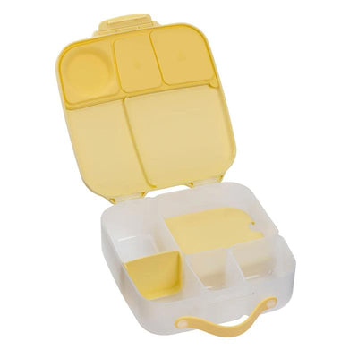 Oversized yellow lunch box for kids, featuring multiple compartments for food organization.