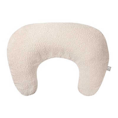 Boppy nursing pillow in oatmeal boucle fabric, designed for breastfeeding support and comfort.