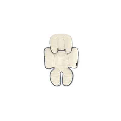 Britax Head & Body Support Pillow in soft cream with gray trim, designed for infant comfort and support during travel.