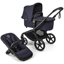 Bugaboo Fox 5 Renew Complete Bassinet and Seat in Deep Indigo, featuring a black frame with a light canopy and seat.