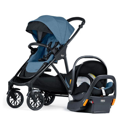 Chicco Corso LE ClearTex Modular Travel System in Tidal color, featuring a stroller with a blue canopy and a detachable infant car seat.