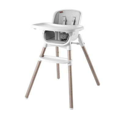 Chicco Zest 4-In-1 Folding High Chair in Crema, featuring a white tray and wooden legs with a soft gray seat.