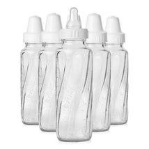 Six Evenflo Feeding classic glass bottles, 8 oz, with white caps and markings for measurement.
