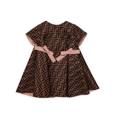 Baby dress featuring an all-over Fendi logo pattern and pink blush bows, suitable for 12-month-olds.