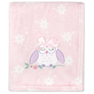 Soft pink blanket featuring an embroidered owl with a bow and floral accents. Ideal for baby use.
