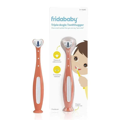 Fridababy Smilefrida 2.0 Toothhugger in pink with a triple-angle brush head, designed for easy and effective tooth cleaning.