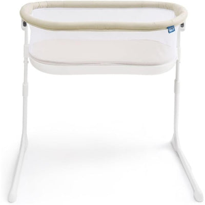 HALO BassiNest Lite in Oat color, featuring a mesh side for visibility and a soft sleeping surface, designed for infants.