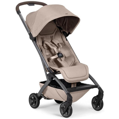 Lightweight compact stroller Joolz Aer² in Sandy Taupe, featuring a large canopy, adjustable seat, and locking wheels.