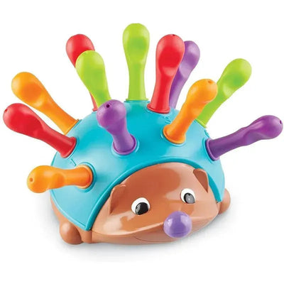 Colorful hedgehog toy with multiple peg-like spikes, designed for fine motor skill development in children aged 18 months and older.