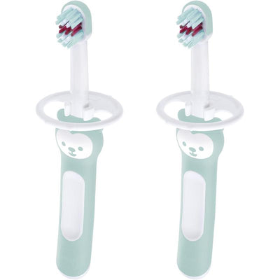 Set of two baby toothbrushes designed for boys aged 6 months and older, featuring a playful bear design and protective ring.
