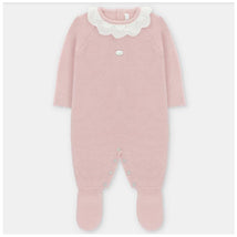Baby pink long romper with feet, featuring a scalloped white collar and snap buttons at the bottom.