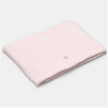 Martin Aranda baby blanket in a soft Boal baby pink color, featuring a knitted texture and decorative button detail.