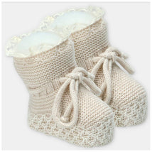 Martin Aranda booties in a sweater knit cotton blend, featuring a lace trim and bow detail, in a neutral color.