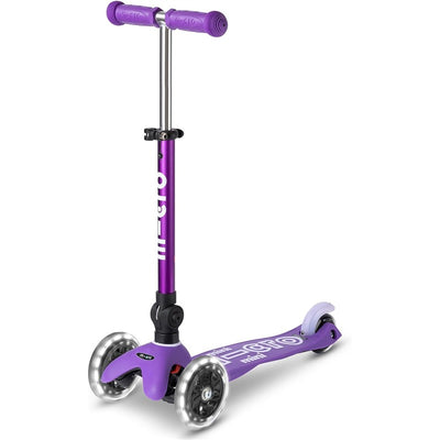 Micro Kickboard mini foldable purple scooter for kids, featuring motion-activated PU LED wheels and adjustable handlebars.