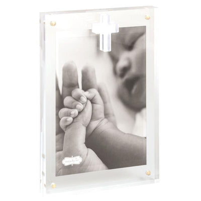 Vertical layered clear acrylic frame featuring a black-and-white photo of an adult and baby hands together.