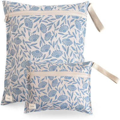 Mushie water-resistant wet bags in blue flower design, including one large and one small bag with zippers.
