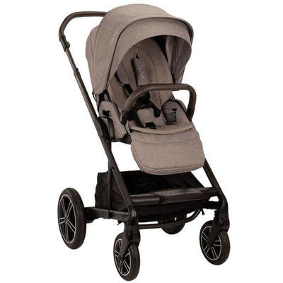 Nuna MIXX™ next Stroller in Cedar color features a magnetic buckle, adjustable canopy, and spacious storage basket.