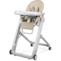 High chair Peg Siesta in Astral Beige, featuring a padded seat, adjustable tray, and safety straps.