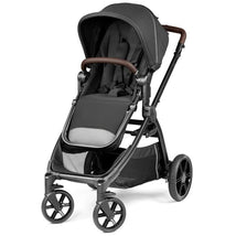 Peg Ypsi Single-to-Double Stroller in True Black featuring a spacious seat, adjustable canopy, and a storage basket.