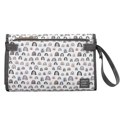 Diaper clutch featuring a colorful rainbow pattern, designed for changing babies on-the-go.