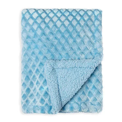 Plush, two-layer blue blanket with a textured diamond pattern on one side and soft, fluffy fabric on the reverse.