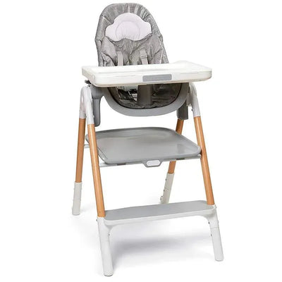 Sit-to-step convertible high chair in grey with a padded seat, safety harness, and removable tray.