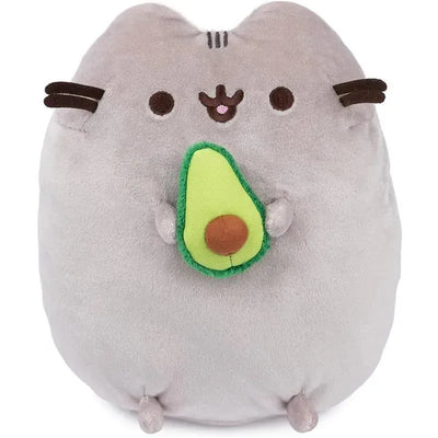 Gray stuffed animal resembling Pusheen, holding a plush avocado, 9.5 inches, for ages 8 and up.