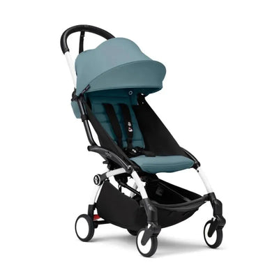 Stokke Yoyo³ stroller in aqua color with white frame, featuring a reclining seat and storage basket.