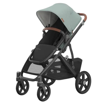 Uppababy Vista V3 stroller in Mystic Aqua with a carbon frame and saddle leather handle, designed for urban mobility.