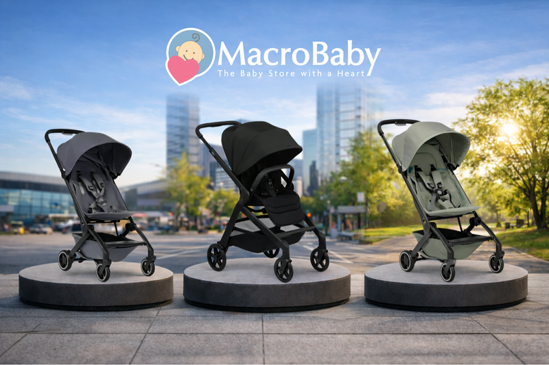Three lightweight baby strollers in gray, black, and green displayed outdoors with city skyline background