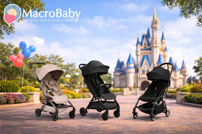 Three lightweight baby strollers in beige and black, displayed on a brick path near a castle with balloons, ideal for travel and Disney trips.
