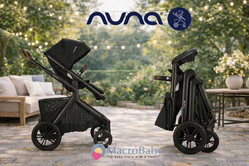 Nuna baby stroller in black, shown assembled and folded, on patio with string lights
