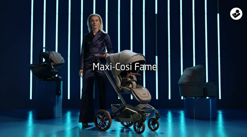 Maxi-Cosi Fame stroller with car seat, showcased in modern studio setting for baby gear