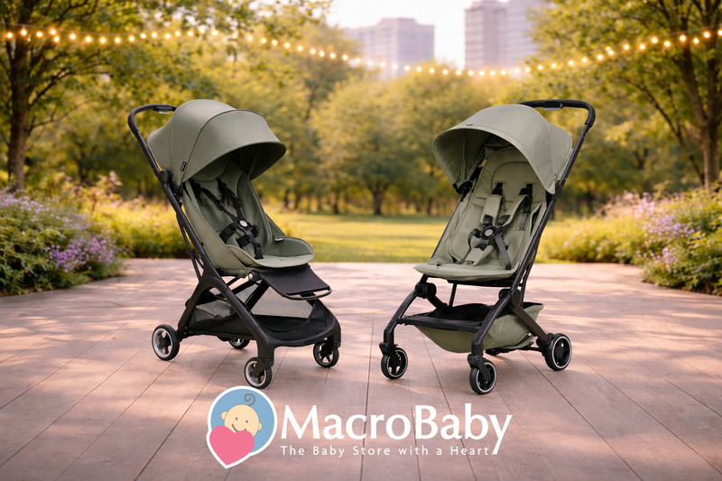 Two olive green baby strollers on a park path with string lights, ideal for urban outings and daily walks.