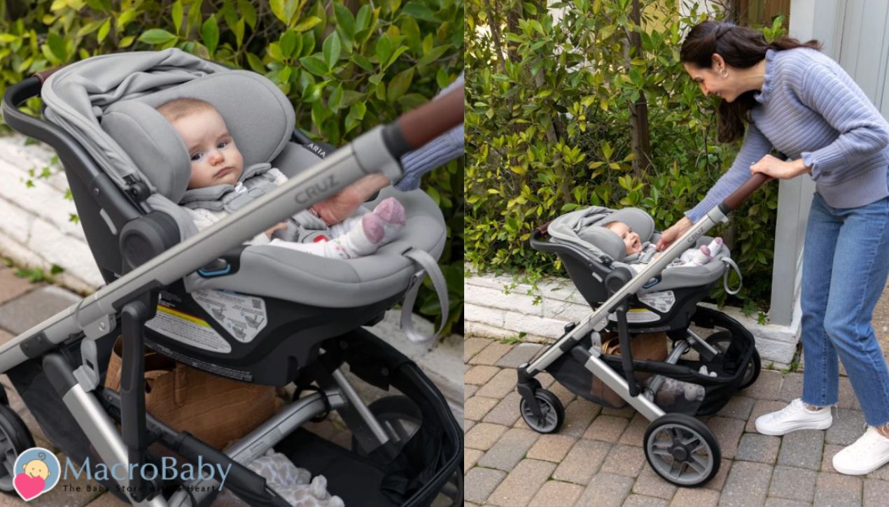 Baby in gray Cruz car seat stroller, mom smiling outdoors, perfect for safe, stylish travel