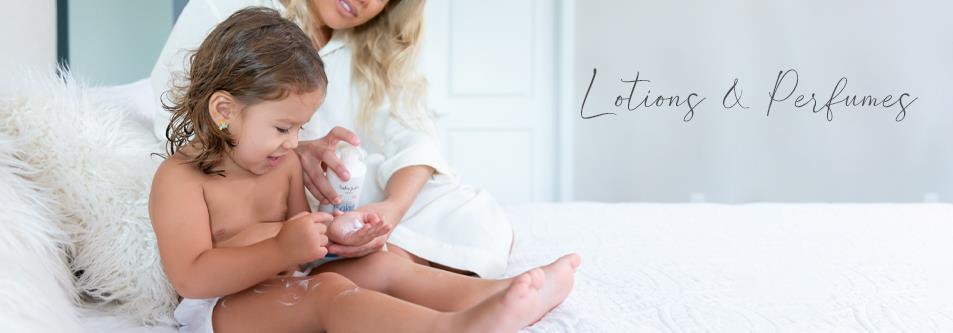 Mom applying baby lotion to toddler’s skin, gentle skincare for babies, lotions & perfumes