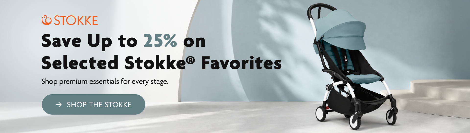 Baby in striped swimsuit on beach with Stokke up to 20% off promo