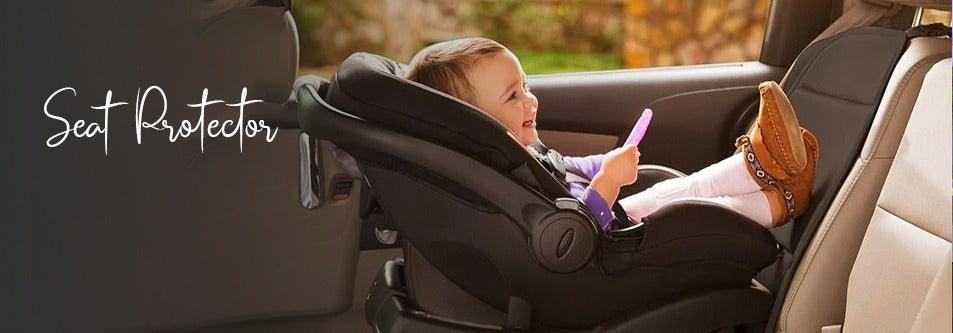 Baby in car seat with seat protector, holding toy, safe travel for infants and toddlers