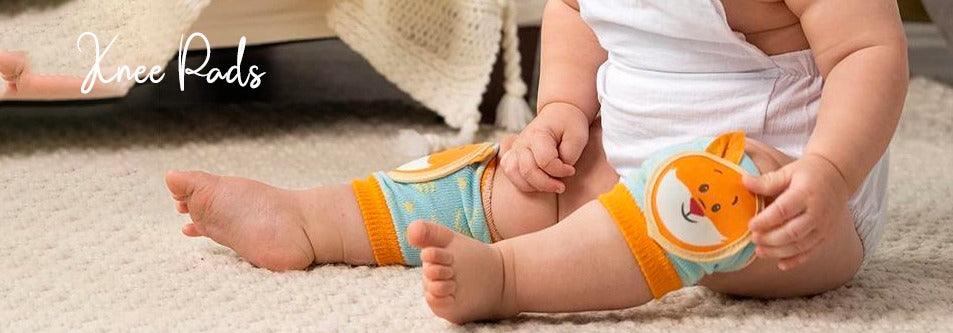 Baby wearing cute lion knee pads for crawling, soft fabric protection for infants