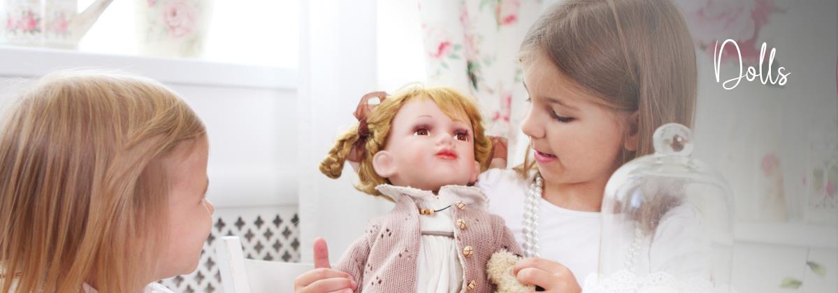 Little girl playing with a blonde doll in cozy room, perfect for baby & toddler toys