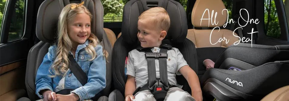 Two kids smiling in all-in-one car seats, safe and comfortable for travel