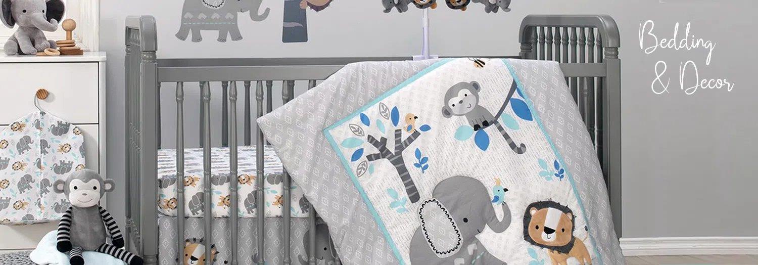 Safari-themed baby crib bedding set with monkey, elephant, lion, and blue accents for nursery decor