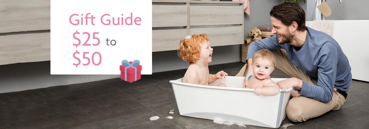 Dad bathing two babies in a tub, gift guide $25 to $50 for baby essentials