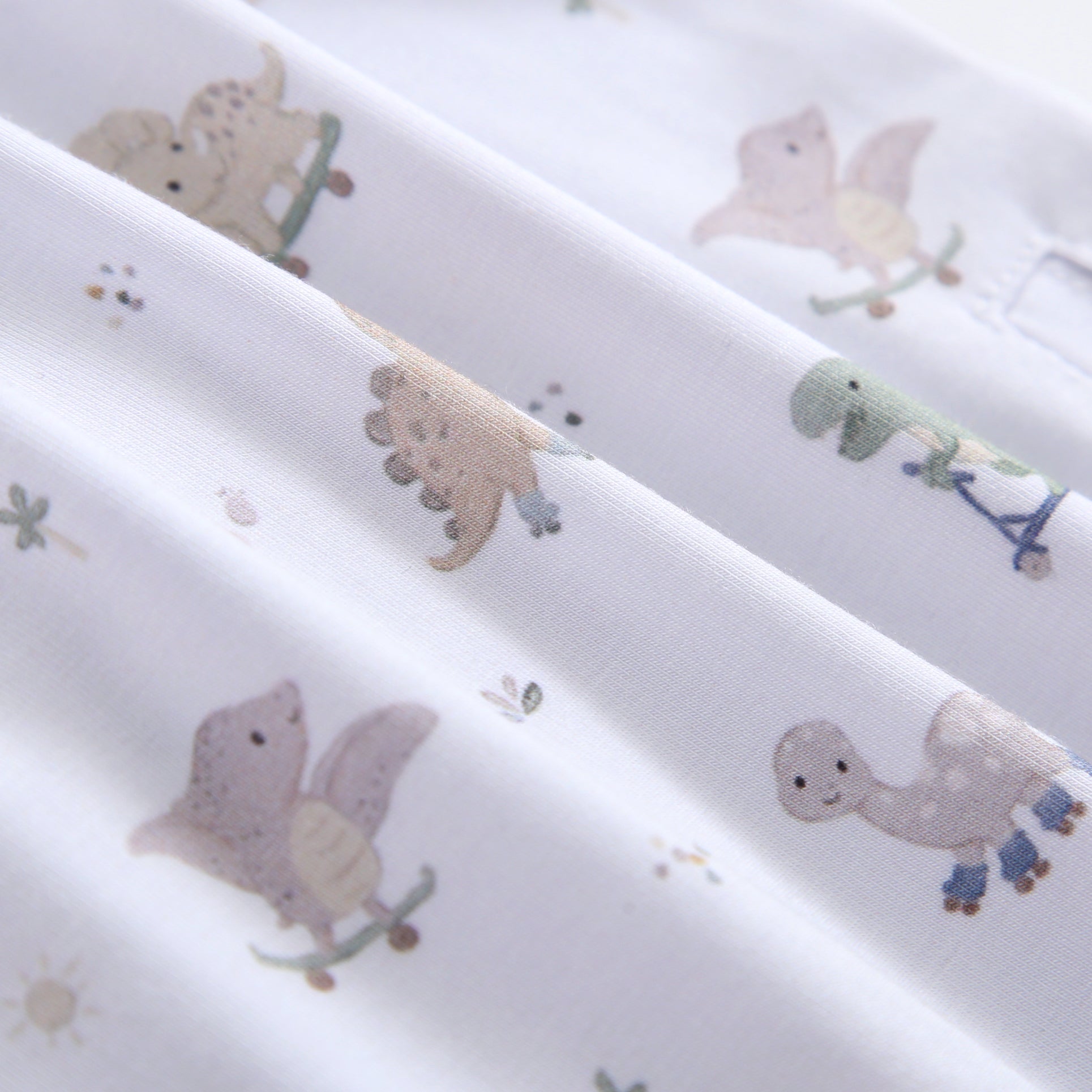 Dino Derby Swaddle Blanket