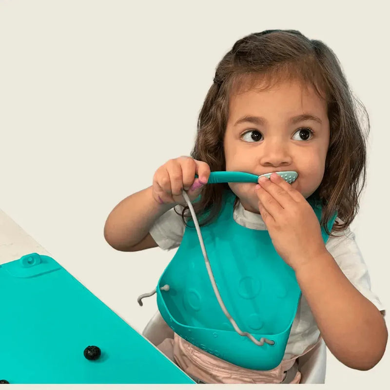 Babador de viagem Stop-Drop + amarras